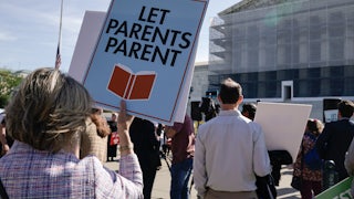 People supporting the right to remove children from classes containing LGBTQ-related content demonstrated outside the Supreme Court during oral arguments