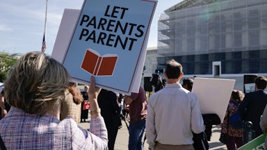People supporting the right to remove children from classes containing LGBTQ-related content demonstrated outside the Supreme Court during oral arguments