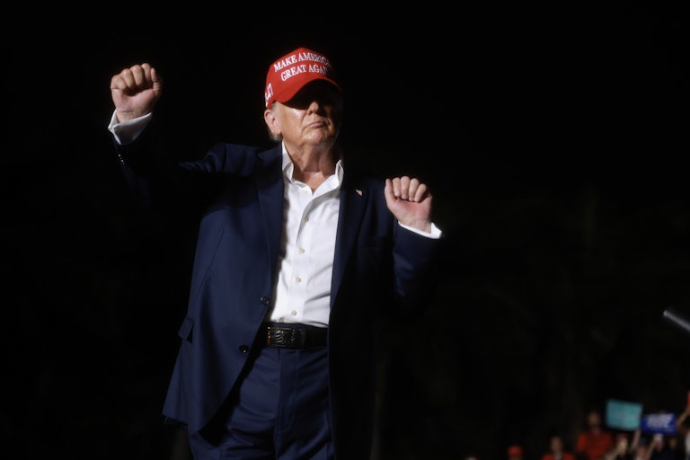 Donald Trump waves his fists in the air