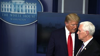 Donald Trump looms over Mike Pence.