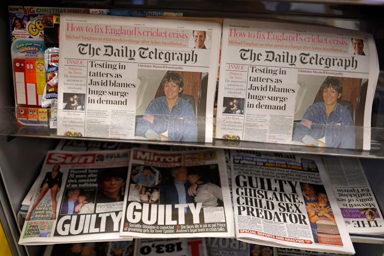 Newspapers at a store in London the day after Ghislaine Maxwell was found guilty of grooming young girls for Jeffrey Epstein