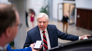 Lindsey Graham yelling and pointing at something off camera