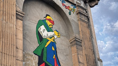 A photo of a mural in Zaporizhzhia, Ukraine, depicts a Cossack flying a drone.