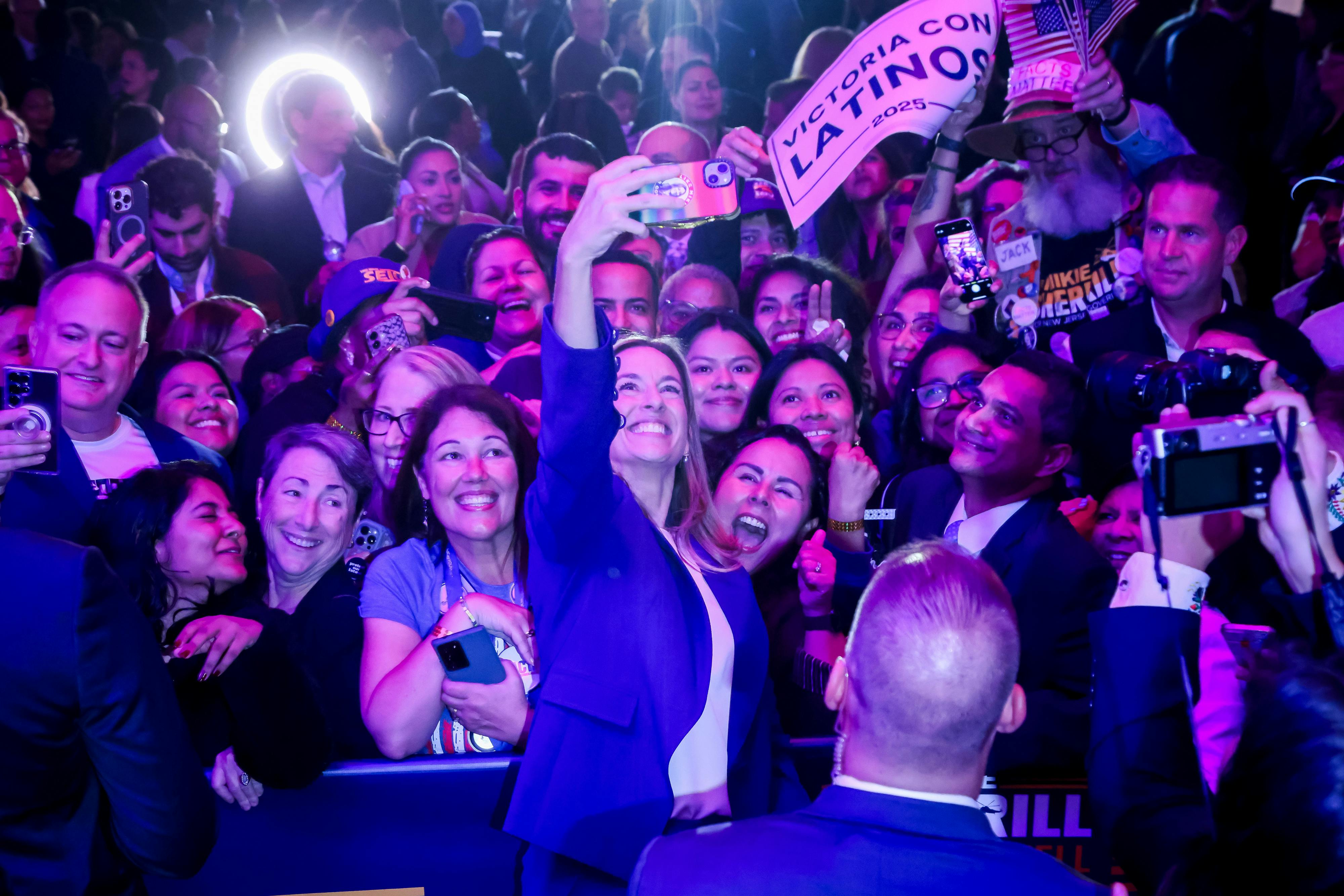 Representative Mikie Sherrill, Democratic gubernatorial candidate for New Jersey, takes a photo with attendees during an election night event in East Brunswick, New Jersey on November 4.