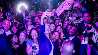 Representative Mikie Sherrill, Democratic gubernatorial candidate for New Jersey, takes a photo with attendees during an election night event in East Brunswick, New Jersey on November 4.