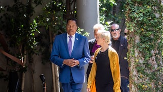 Larry Elder and actress Rose McGowan at a press conference