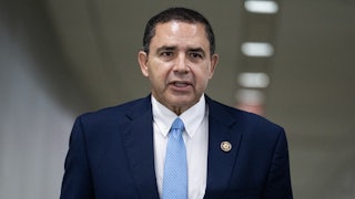 Rep. Henry Cuellar speaks at a meeting.