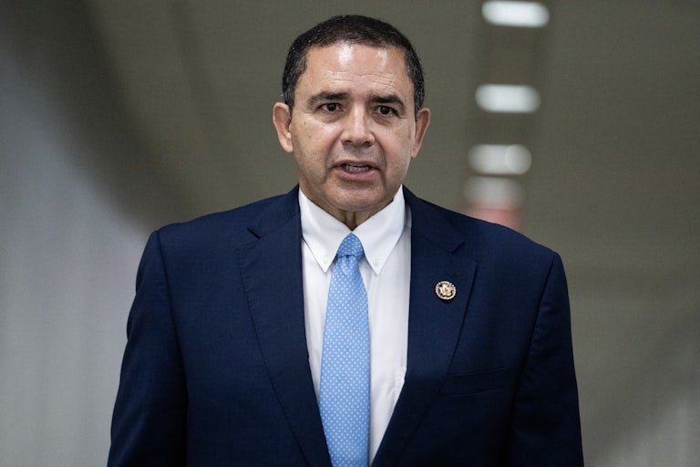 Rep. Henry Cuellar speaks at a meeting.