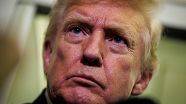 Donald Trump frowns while glaring