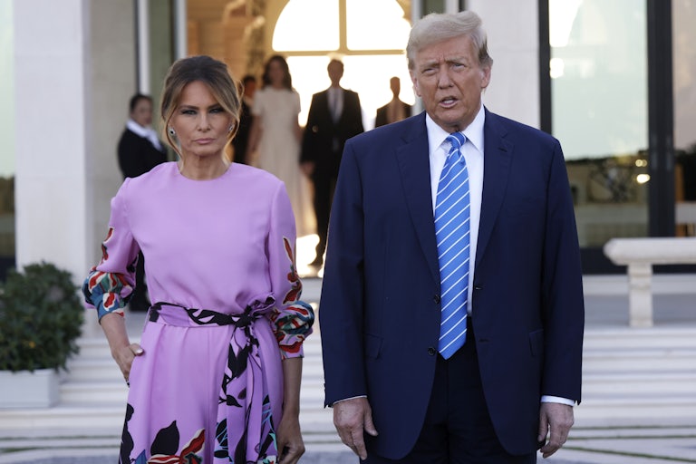 Donald Trump and Melania Trump stand next to each other