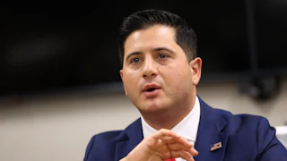 U.S. Attorney Bill Essayli speaking