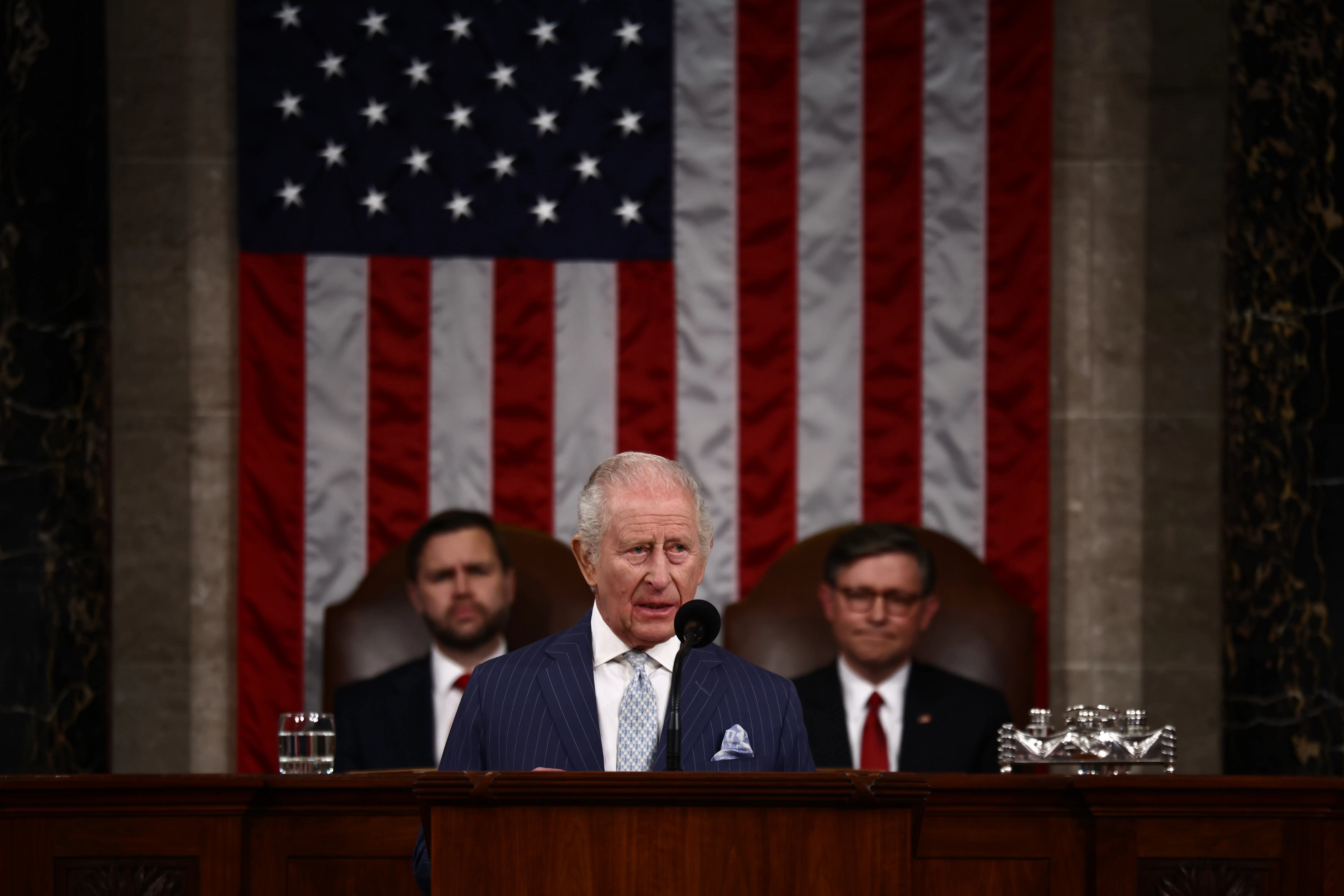 King Charles speaks to Congress as House Speaker Mike Johnson and Vice President JD Vance sit behind him.