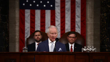 King Charles speaks to Congress as House Speaker Mike Johnson and Vice President JD Vance sit behind him.