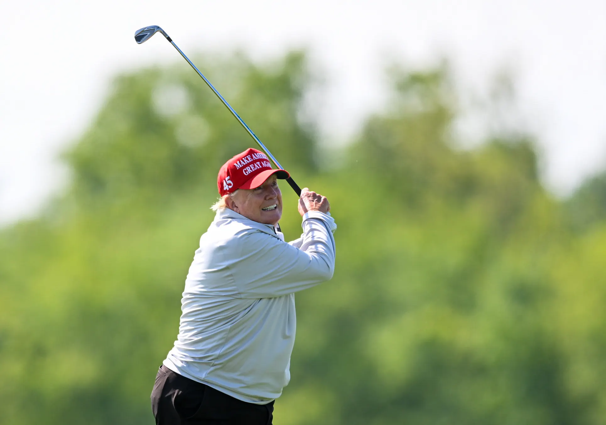 Donald Trump hits the ball out of the rough.
