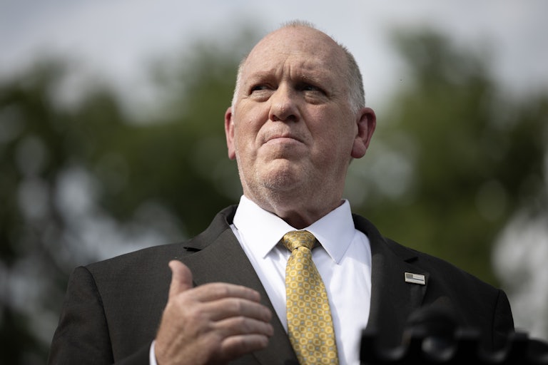Tom Homan gestures while standing outside the White House