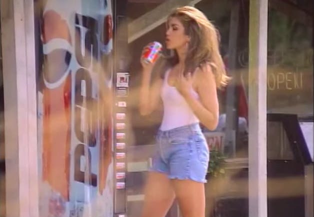 Cindy Crawford in mom jean shorts.