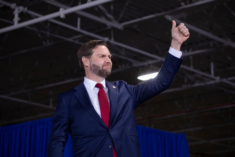 JD Vance gives a big thumbs up and smiles