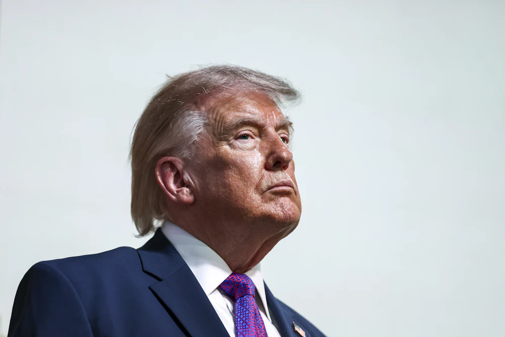 Donald Trump frowns in profile