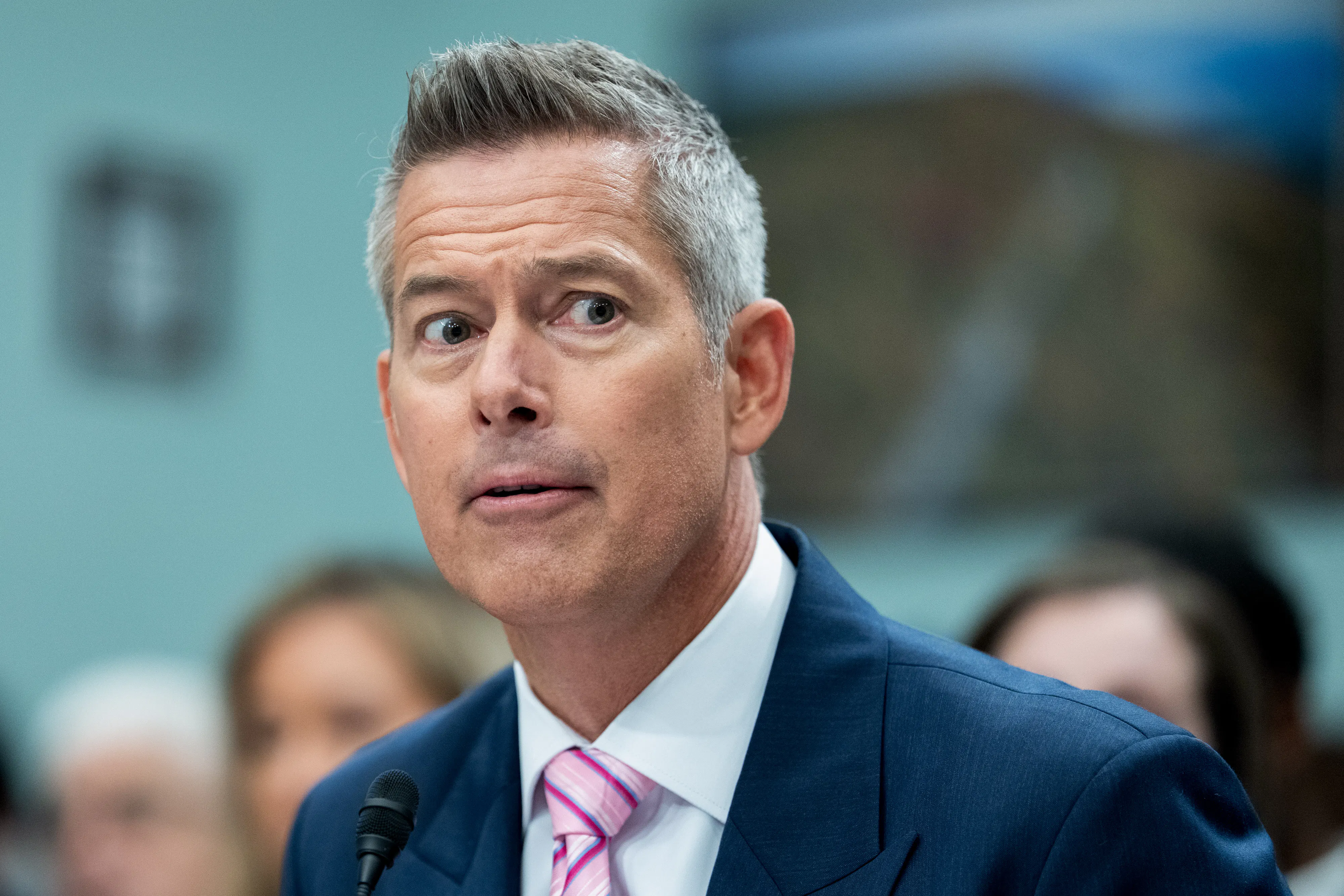 Transportation Secretary Sean Duffy looks to the side during a congressional hearing