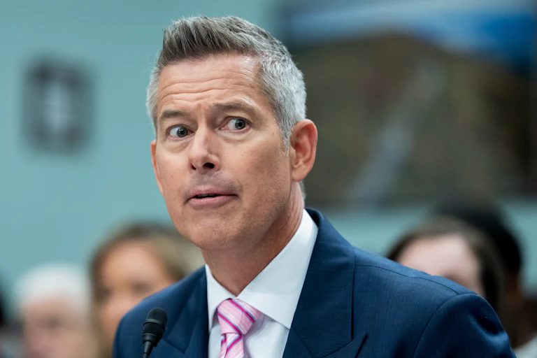 Transportation Secretary Sean Duffy looks to the side during a congressional hearing