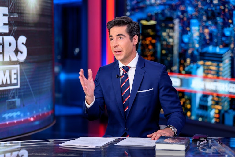 Jesse Watters talks while gesturing with one hand