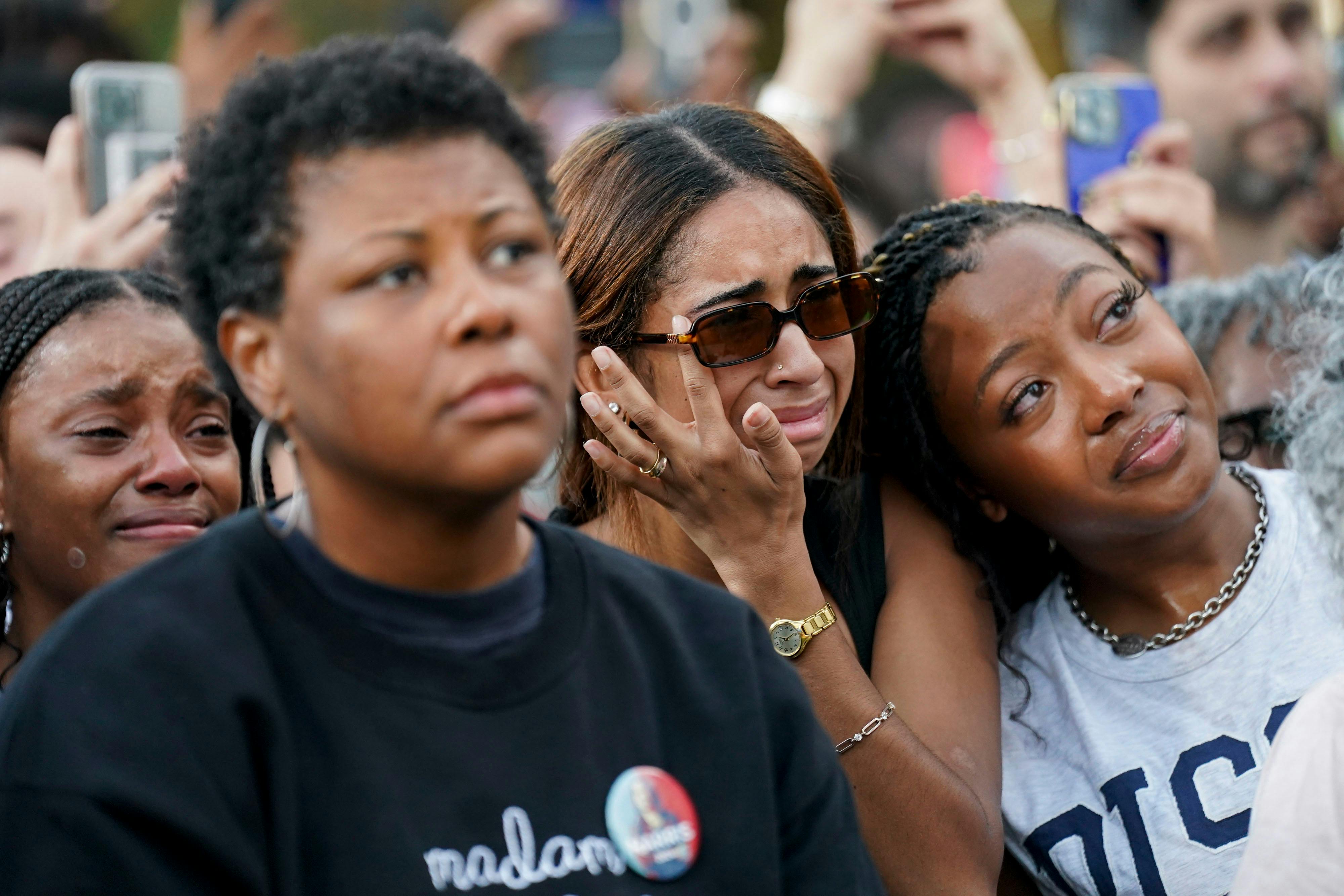 Attendees react as Kamala Harris speaks at Howard University after conceding the election.