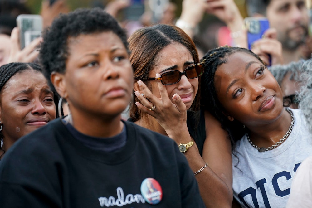 Attendees react as Kamala Harris speaks at Howard University after conceding the election.