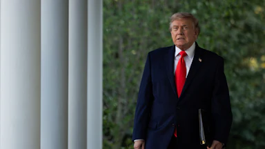 Donald Trump walking in the White House