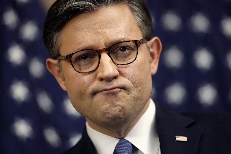 House Speaker Mike Johnson frowns