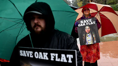 Protestors stand outside the 9th Circuit Court in Pasadena, California, to challenge a mining deal that would destroy the Oak Flat sacred site in Arizona.