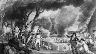 A woodcut of the 1775 Battle of Lexington with British troops opening fire on a band of colonial minutemen, the first military encounter of the American War of Independence. A young woman clings to the arm of a minuteman as he goes to join his comrades.