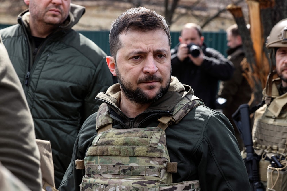 Ukrainian President Volodymyr Zelenskiy stands in the town of Bucha, northwest of the Ukrainian capital Kyiv.