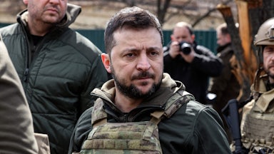 Ukrainian President Volodymyr Zelenskiy stands in the town of Bucha, northwest of the Ukrainian capital Kyiv.