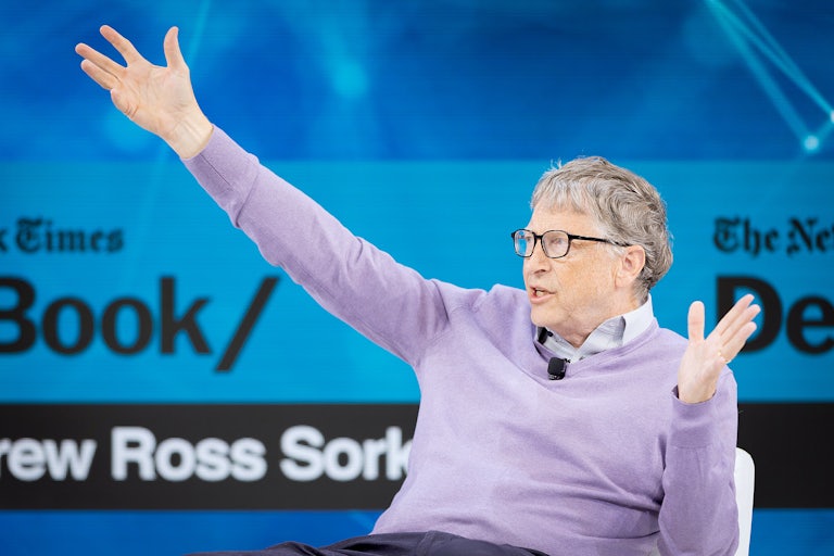 Bill Gates gestures while speaking.