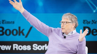 Bill Gates gestures while speaking.