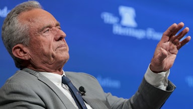 Robert F. Kennedy Jr. gestures with one hand