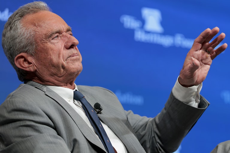Robert F. Kennedy Jr. gestures with one hand