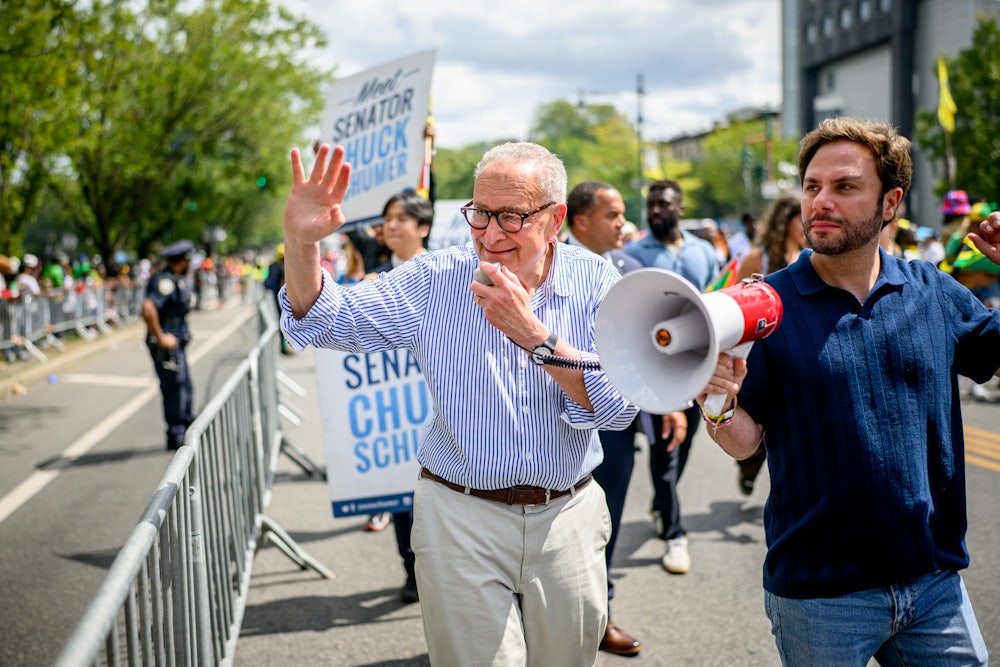 Senate Minority Leader Chuck Schumer marching in a parade in New York