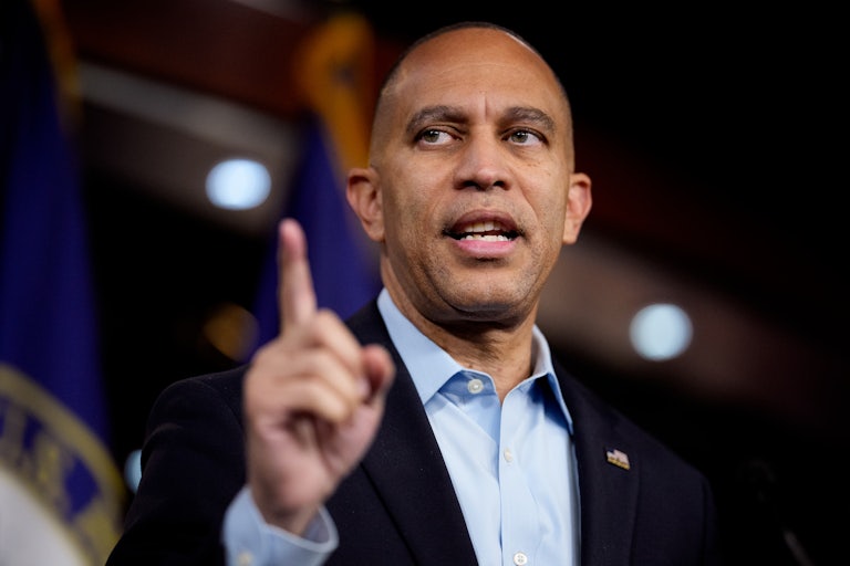 House Minority leader Hakeem Jeffries raises an index finger as he speaks in the Capitol.