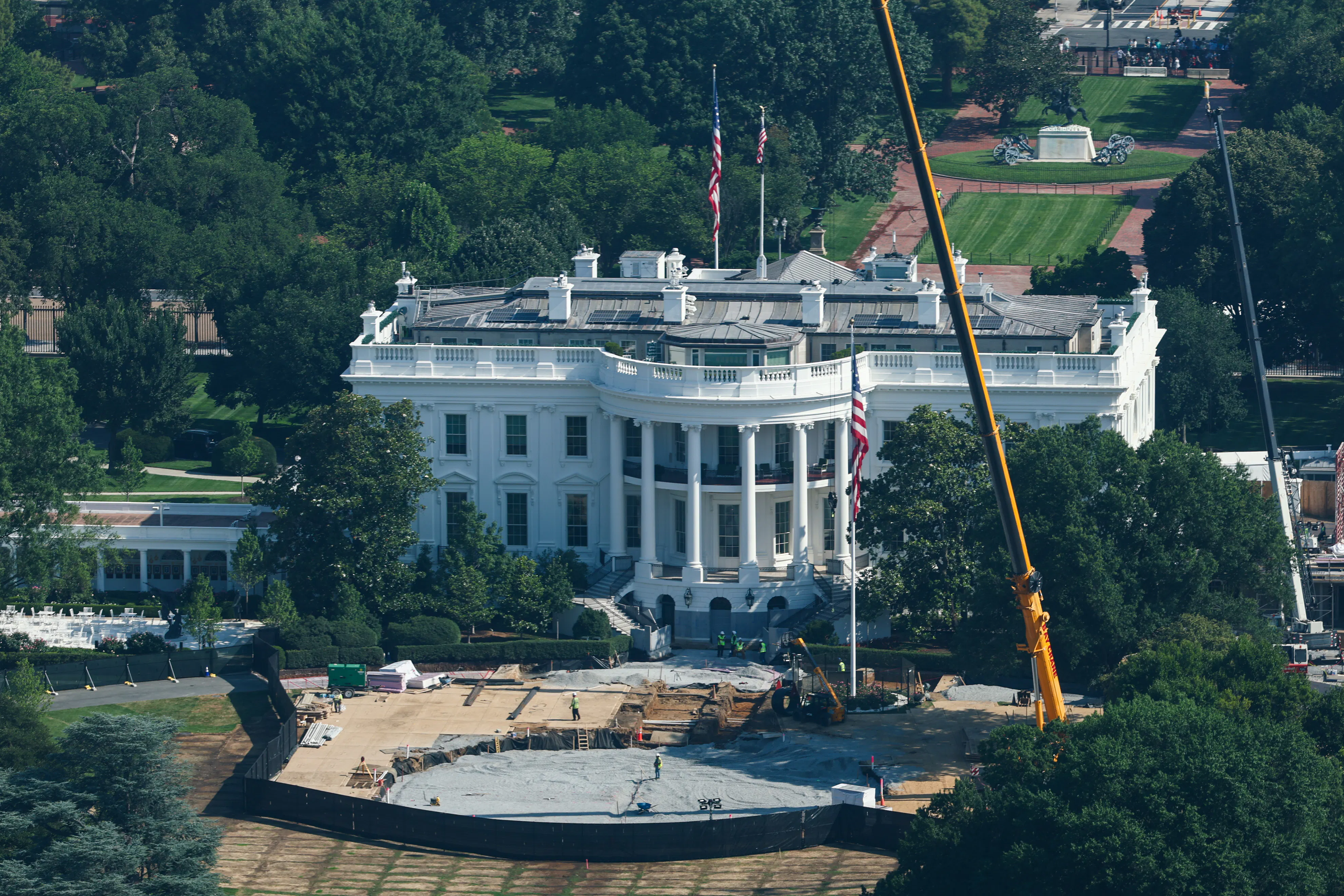 An aerial view of construction of a helipad at the White House