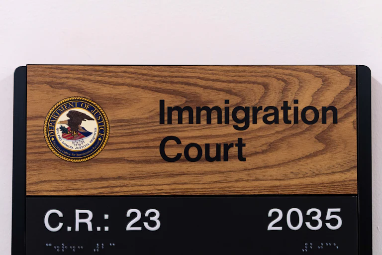 A sign for an immigration courtroom