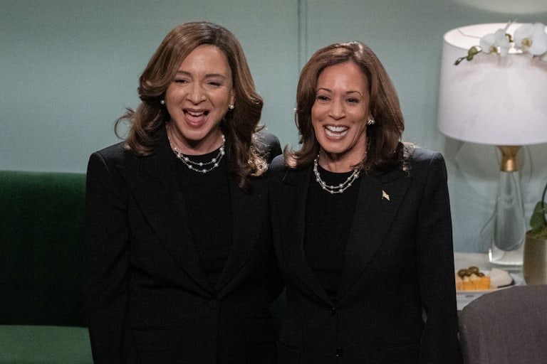 Maya Rudolph and Kamala Harris smile while standing next to each other on SNL