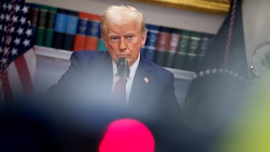Donald Trump takes a question from a reporter during a news conference in the Roosevelt Room of the White House.