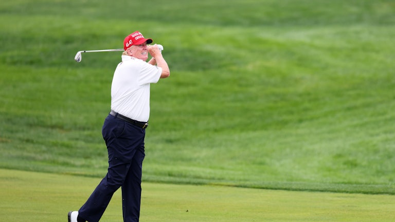 Trump takes a whack at the Trump National Golf Club