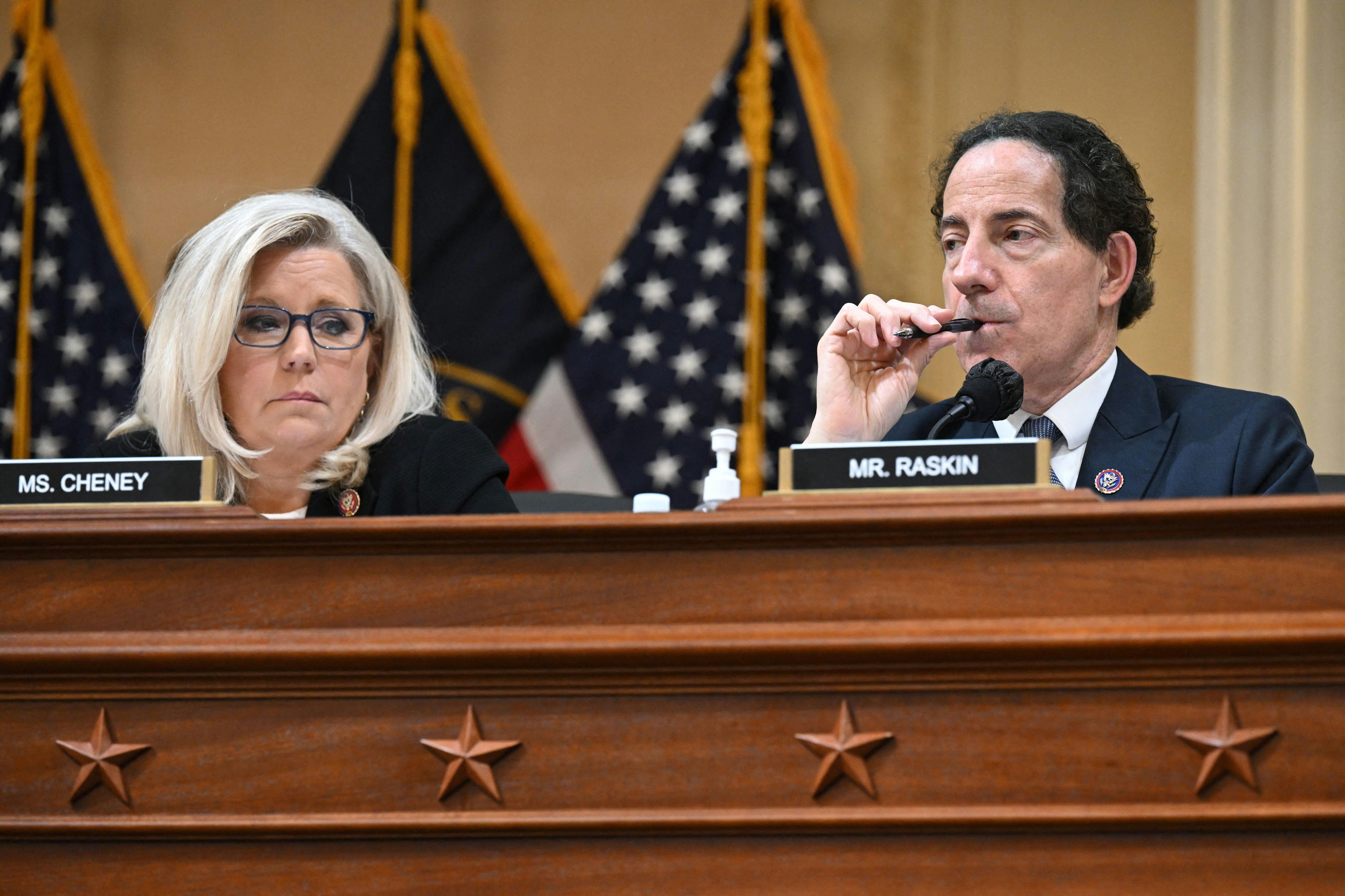 Reps. Jamie Raskin and Liz Cheney listen during a January 6 Committee hearing.