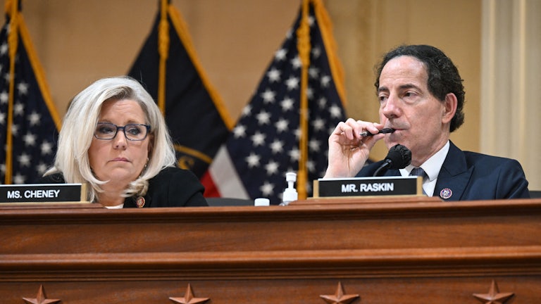 Reps. Jamie Raskin and Liz Cheney listen during a January 6 Committee hearing.