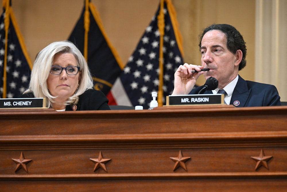 Reps. Jamie Raskin and Liz Cheney listen during a January 6 Committee hearing.