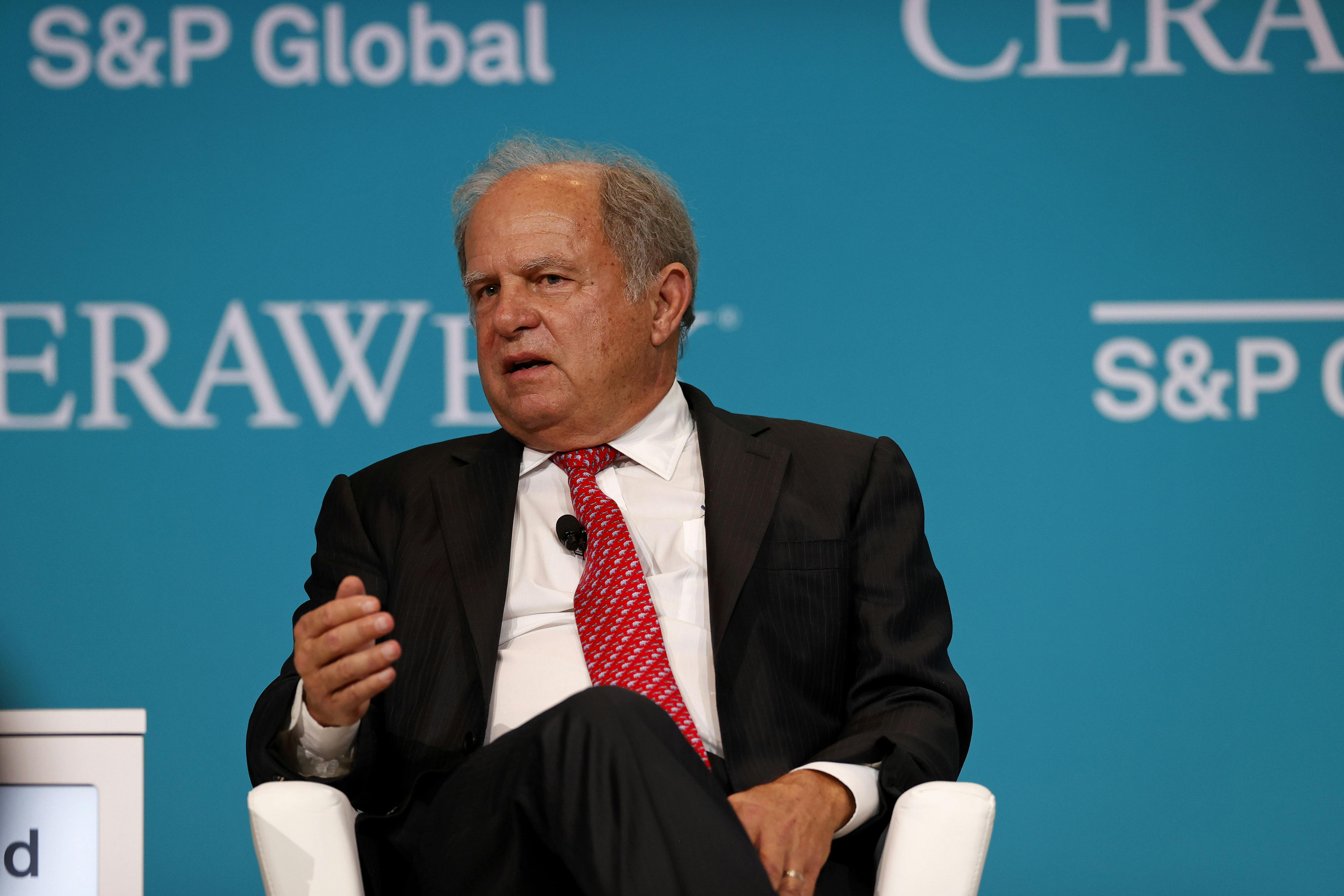 Scott Sheffield speaks while seated.