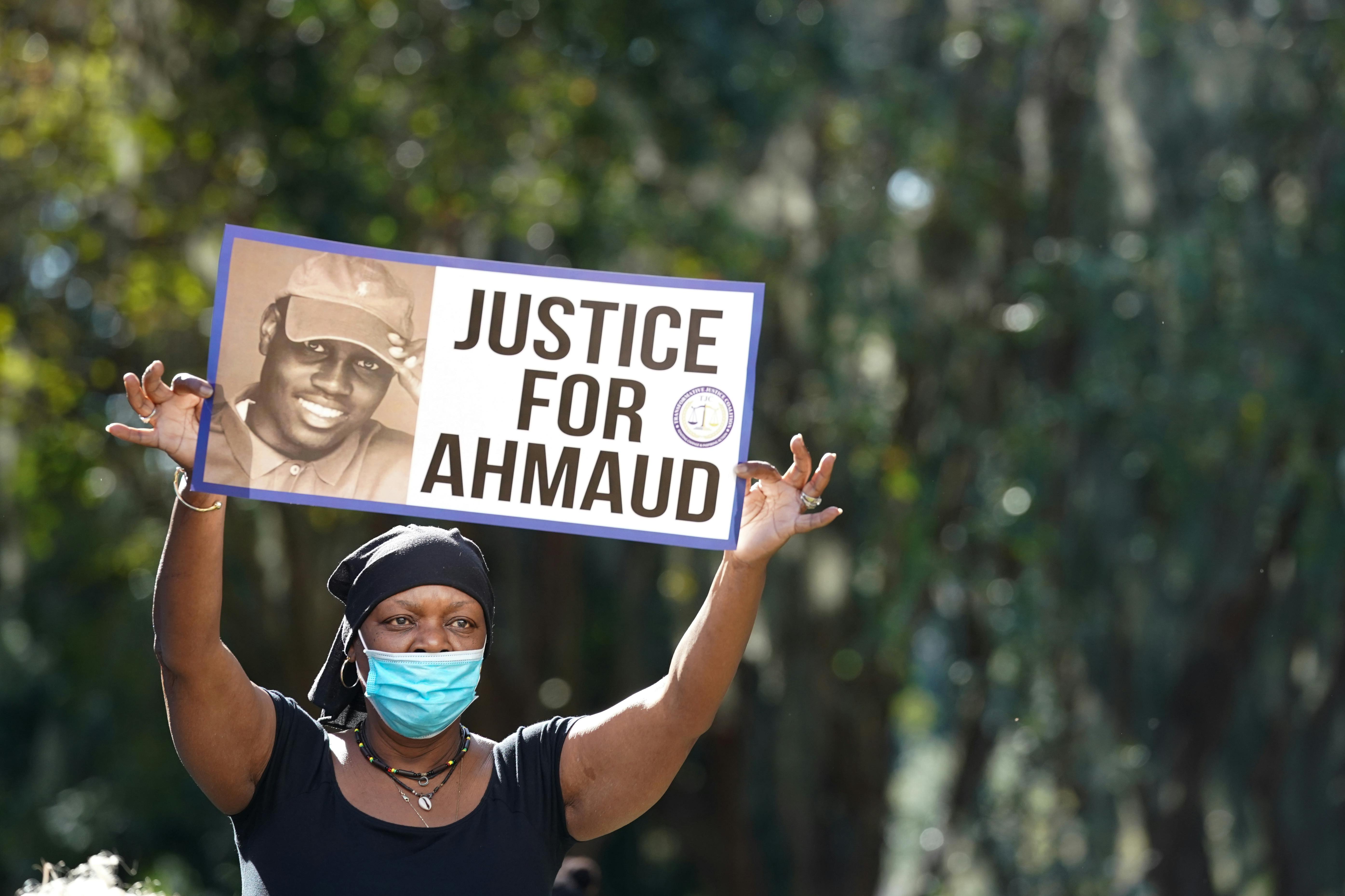 Demonstrator at the trial of the shooting death of Ahmaud Arbery