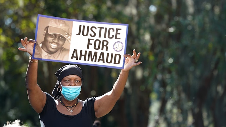 Demonstrator at the trial of the shooting death of Ahmaud Arbery